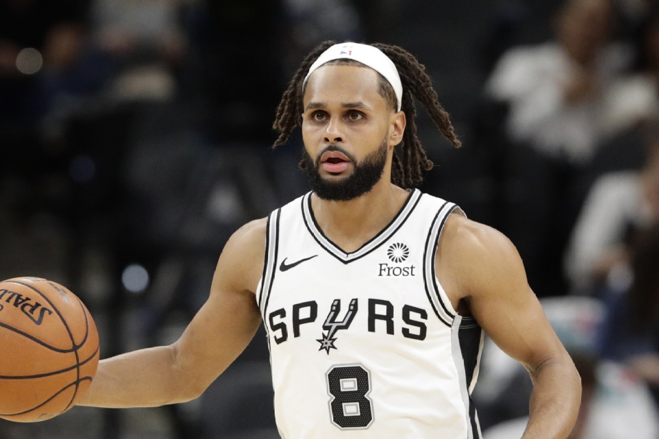 Patty Mills drive forward in Mexico. 