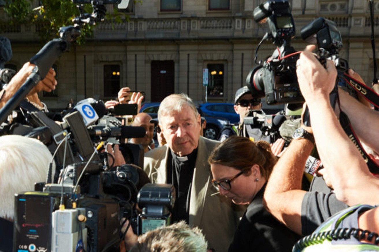 A dozen media companies admitted breaching an order banning publication of Cardinal Pell's conviction. 