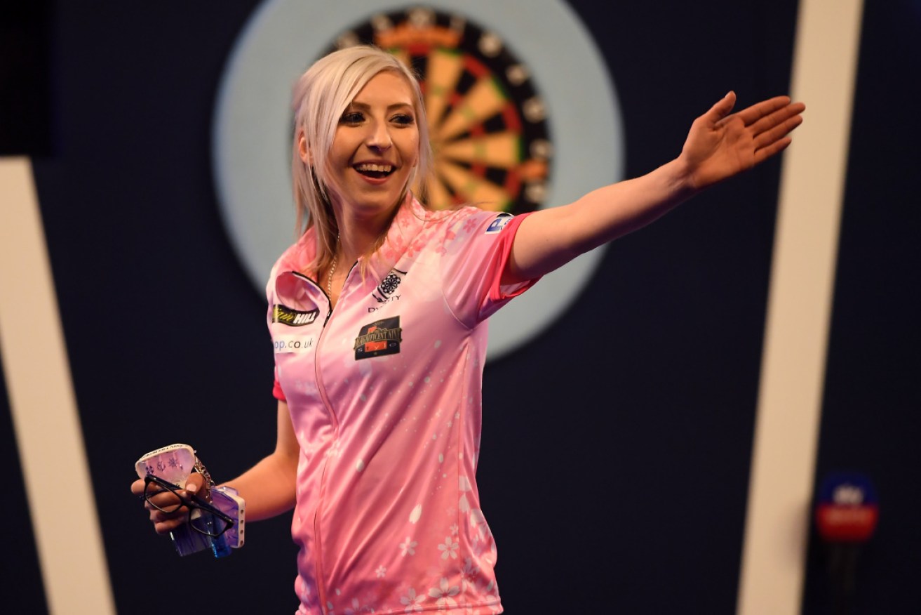 Fallon Sherrock has become the first woman to beat a man at the PDC World Darts Championship.