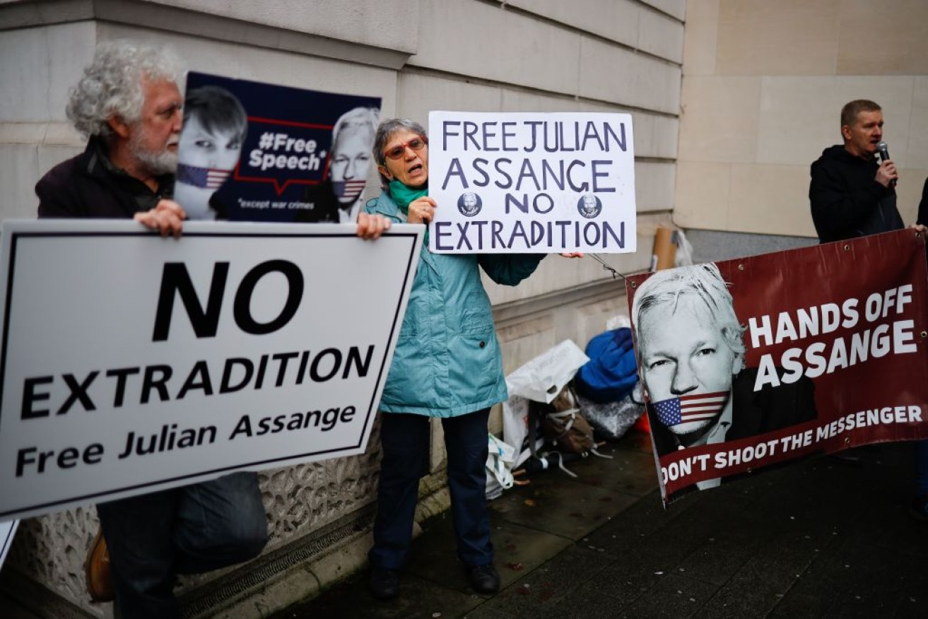 Supporters of Wikileaks founder Julian Assange outside Westminster Magistrates Court in London.