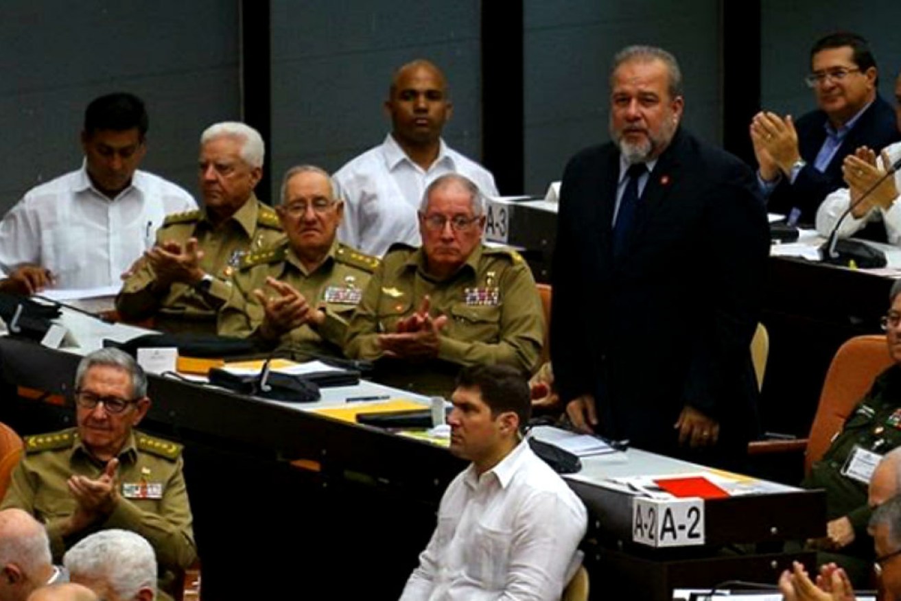 Manuel Marrero Cruz (standing)  has been named Cuba's first prime minister since Fidel Castro in 1976.