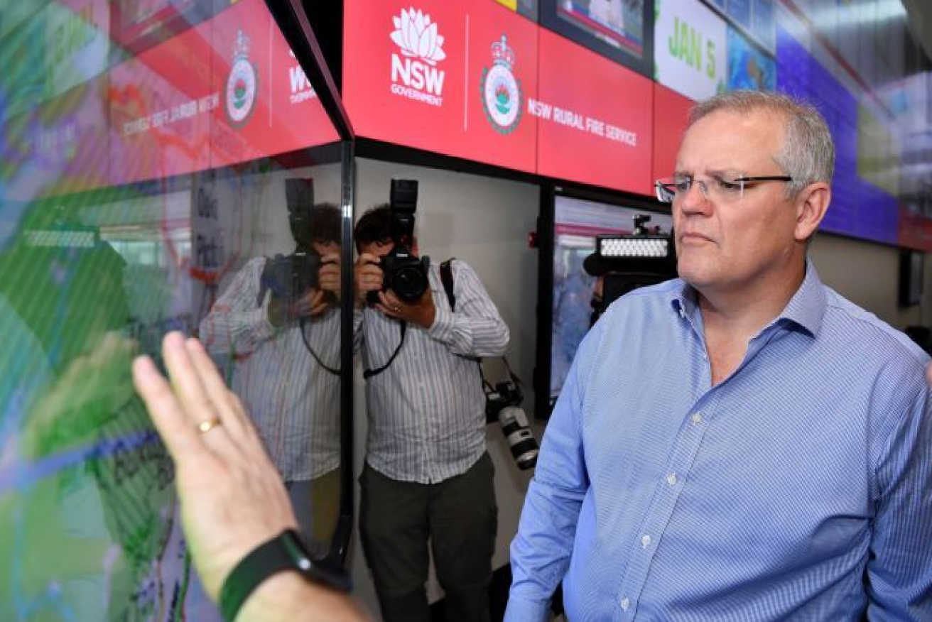Back from his Hawaii holiday, Scott Morrison gets briefed on NSW's horrific fires.