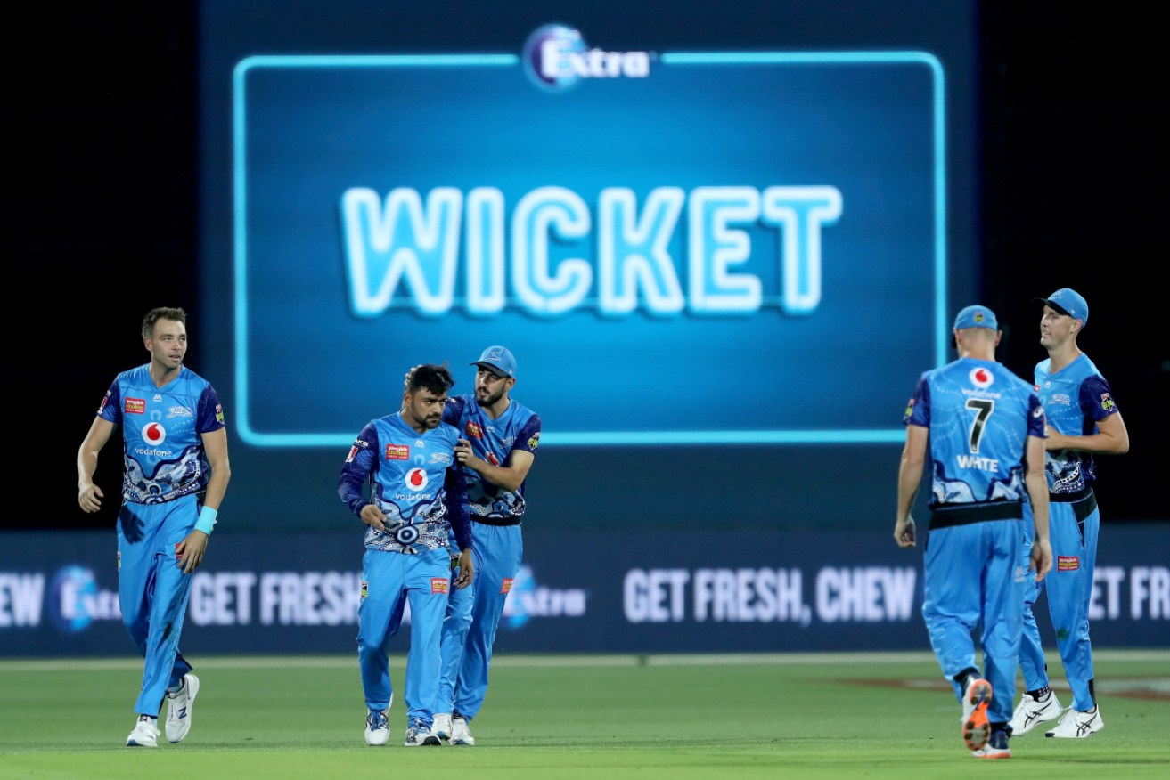 Rashid Khan of Adelaide Strikers celebrates the wicket of Perth's Josh Inglis.