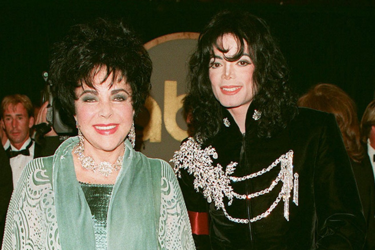 Elizabeth Taylor with Michael Jackson, in the jacket now owned by North West, at her 65th birthday in 1997.