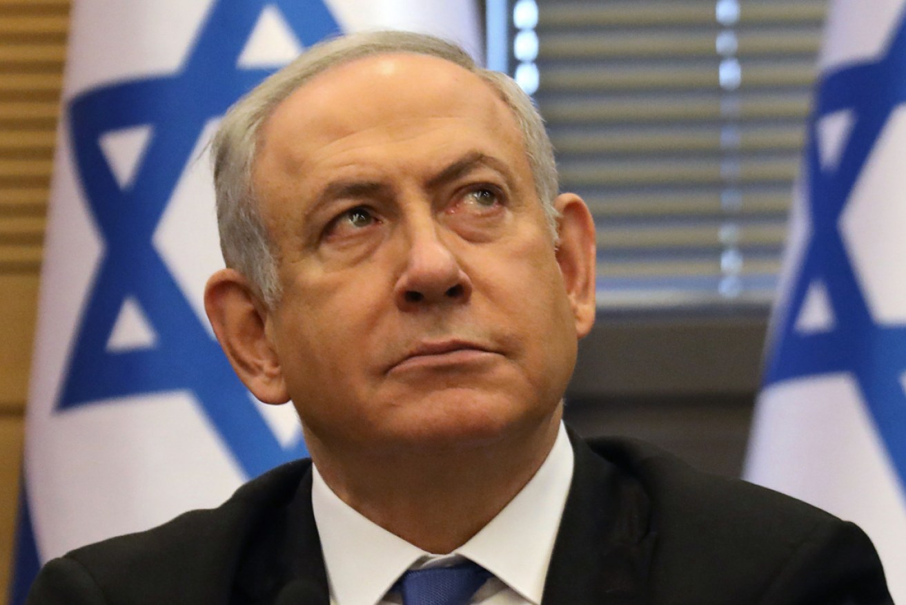 Benjamin Netanyahu took shelter during a campaign event in southern Israel after a rocket was fired from the Gaza Strip.