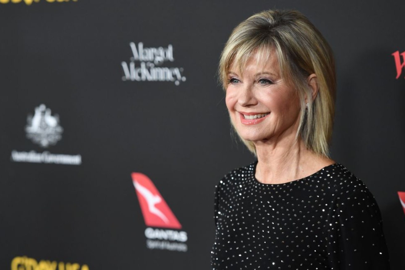 Olivia Newton John has been honoured for her singing, dancing and work with cancer research. 