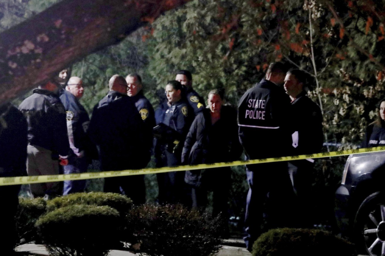 Police have apprehended a suspect after fie people were stabbed at a rabbi's home in New York state.