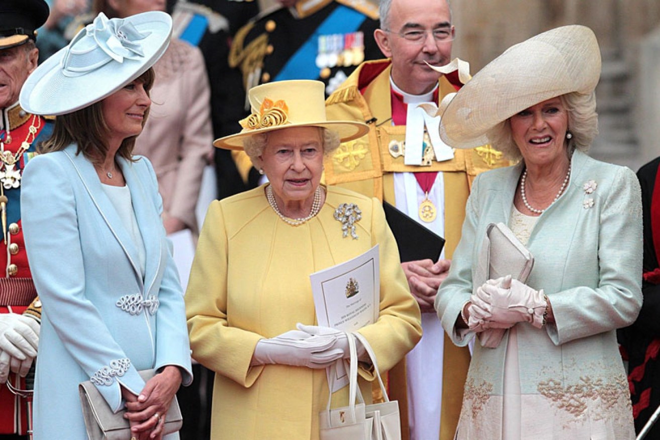 Carole Middleton, (left, with Queen Elizabeth and the Duchess of Cornwall) at her daughter Kate's 2011 royal wedding. 