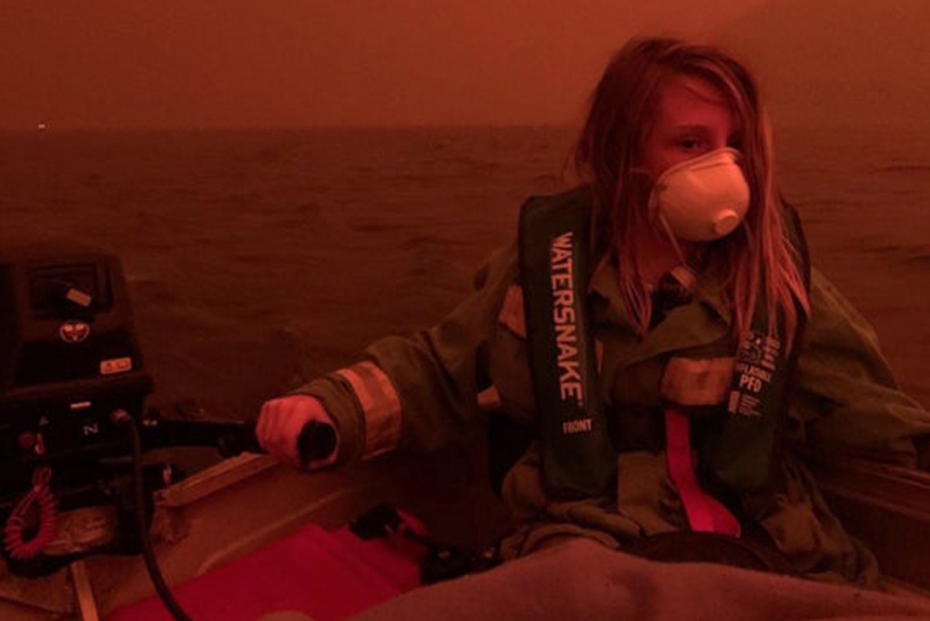 This image of Finn escaping the fires at Mallacoota became the face of the bushfire crisis.