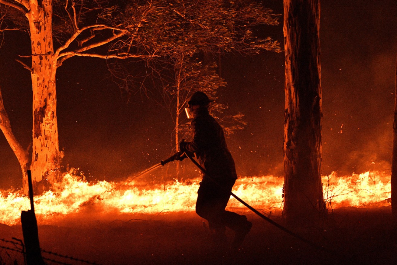 While the fire weather eased on Thursday, firefighters are continuing to battle blazes across NSW and Victoria.