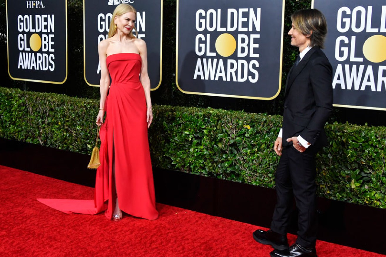 Nicole Kidman and Keith Urban do their signature red carpet look of love at January 5's 2020 Golden Globes.