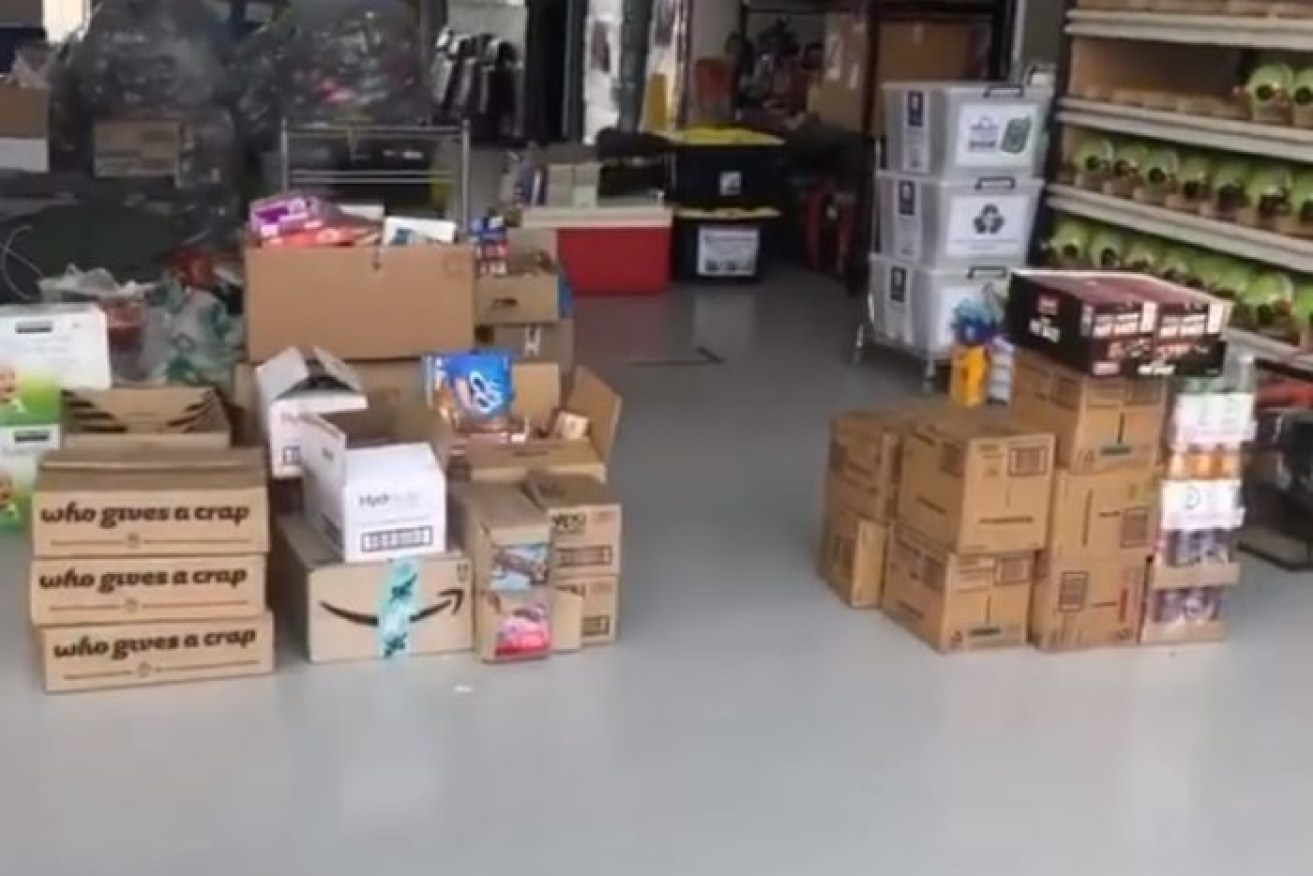 Halls and buildings are being taken over to store a flood of unnecessary donations. 