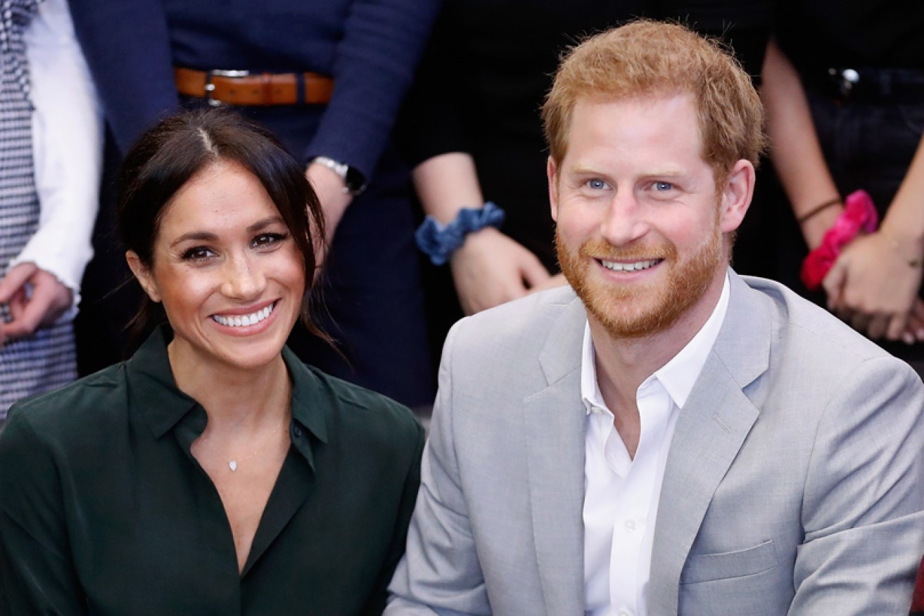 Things looked rosy for Meghan Markle and Prince Harry in May 2018, but an insider said  there were already family rifts.