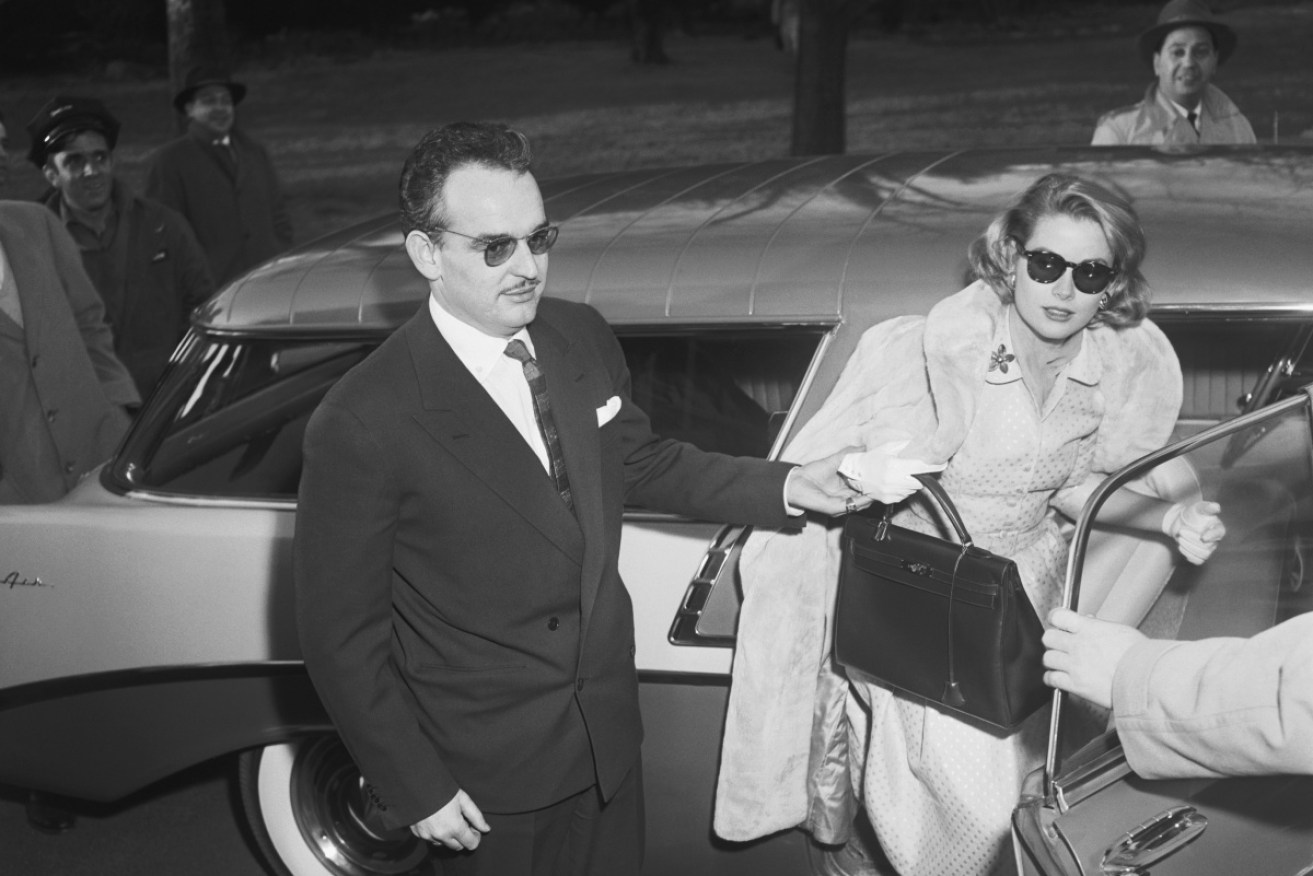 Hollywood star-turned-princess Grace Kelly holds the style of Hermes handbag named after her.