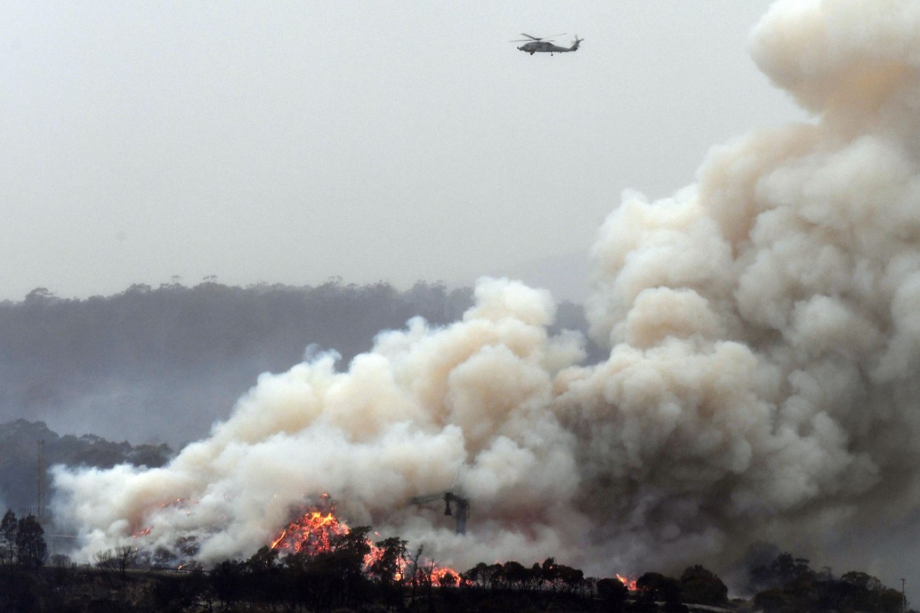 Rainfall in New South Wales and Victoria brought relief over the weekend, but some communities were still under threat from out-of-control blazes.