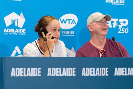 Ash Barty takes call from AFLW captain Kerryn Harrington during press conference