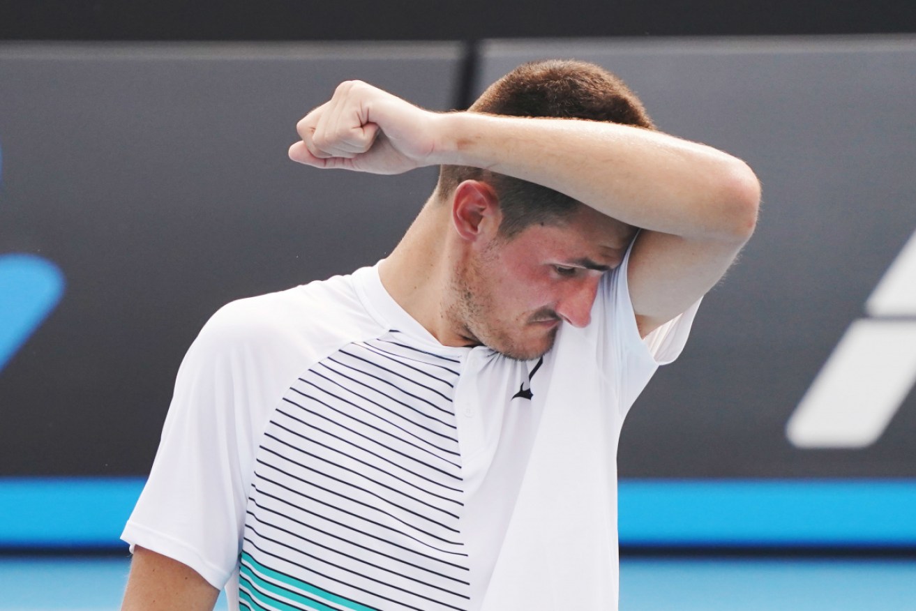 Too hot, too smoky: Bernard Tomic failed to qualify for the Australian Open.