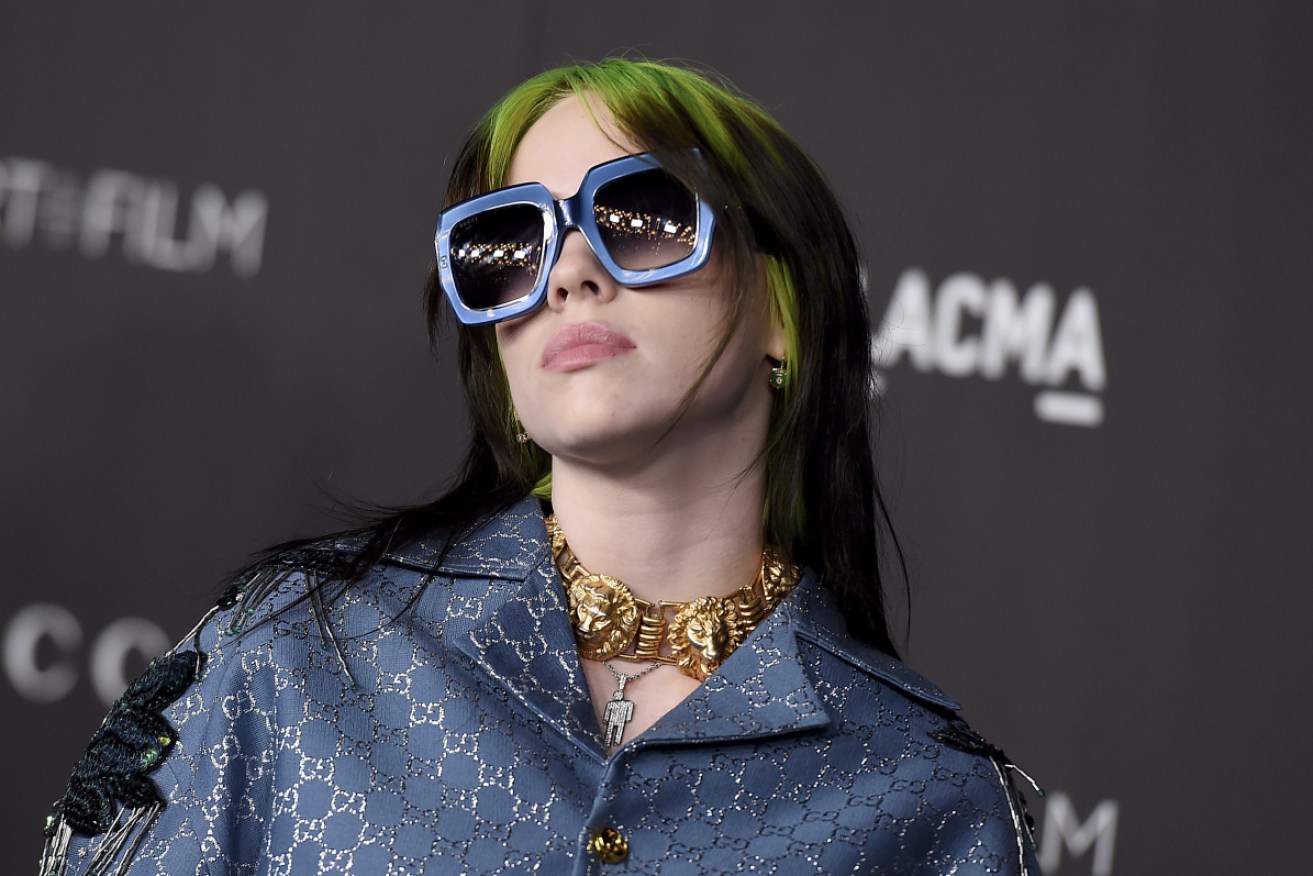 Singer Billie Eilish, at 18, will be the youngest artist ever to write and perform the theme to a James Bond film - the upcoming <i>No Time To Die</i>.