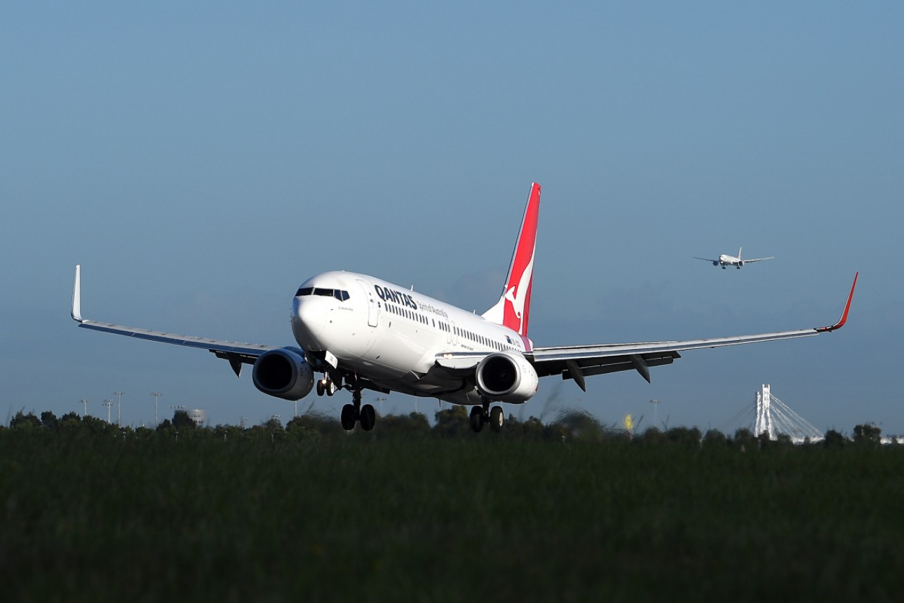 The Qantas Boeing 737 was coming in to land at the same time an Airbus A330 was about to take off.