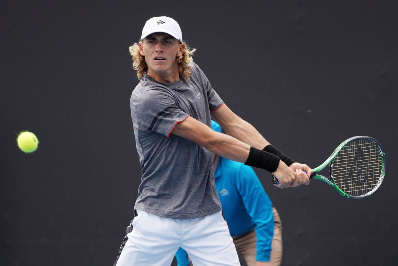 Made it through: Max Purcell in action at Australian Open qualifying.
