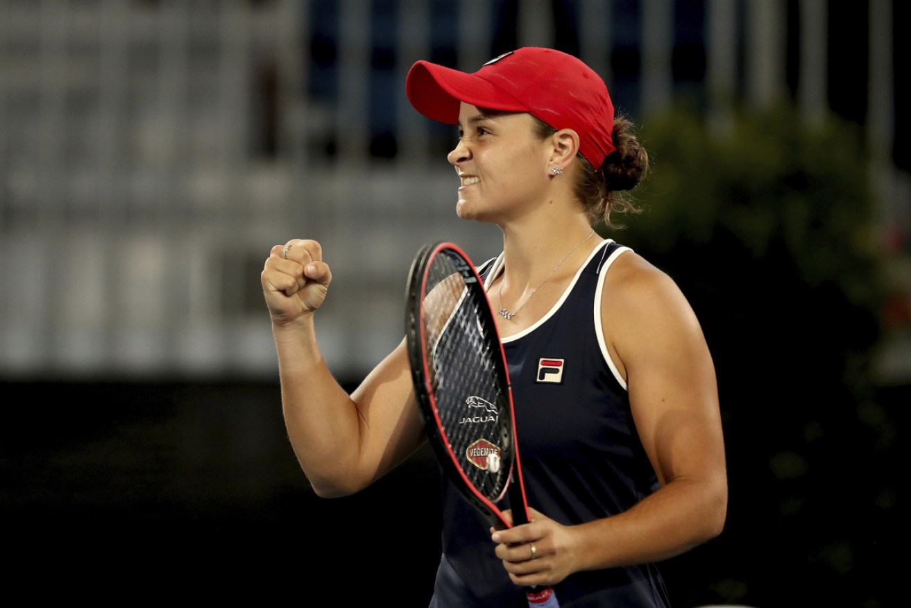 Ash Barty celebrates after winning through to the Adelaide International final, which she won.
