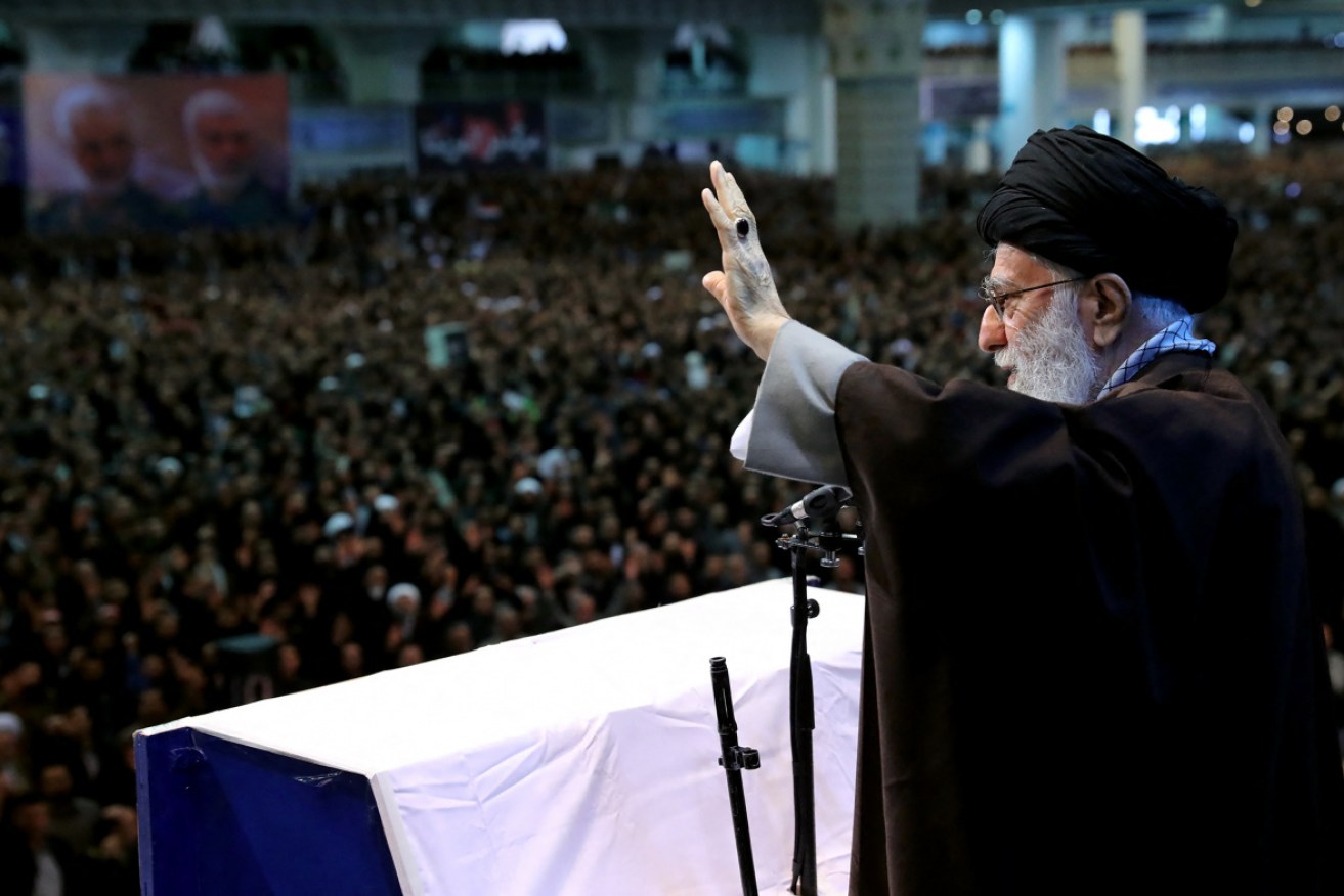 Iran's religious leader Ayatollah Khamenei leads prayer at his first public service in eight years. 