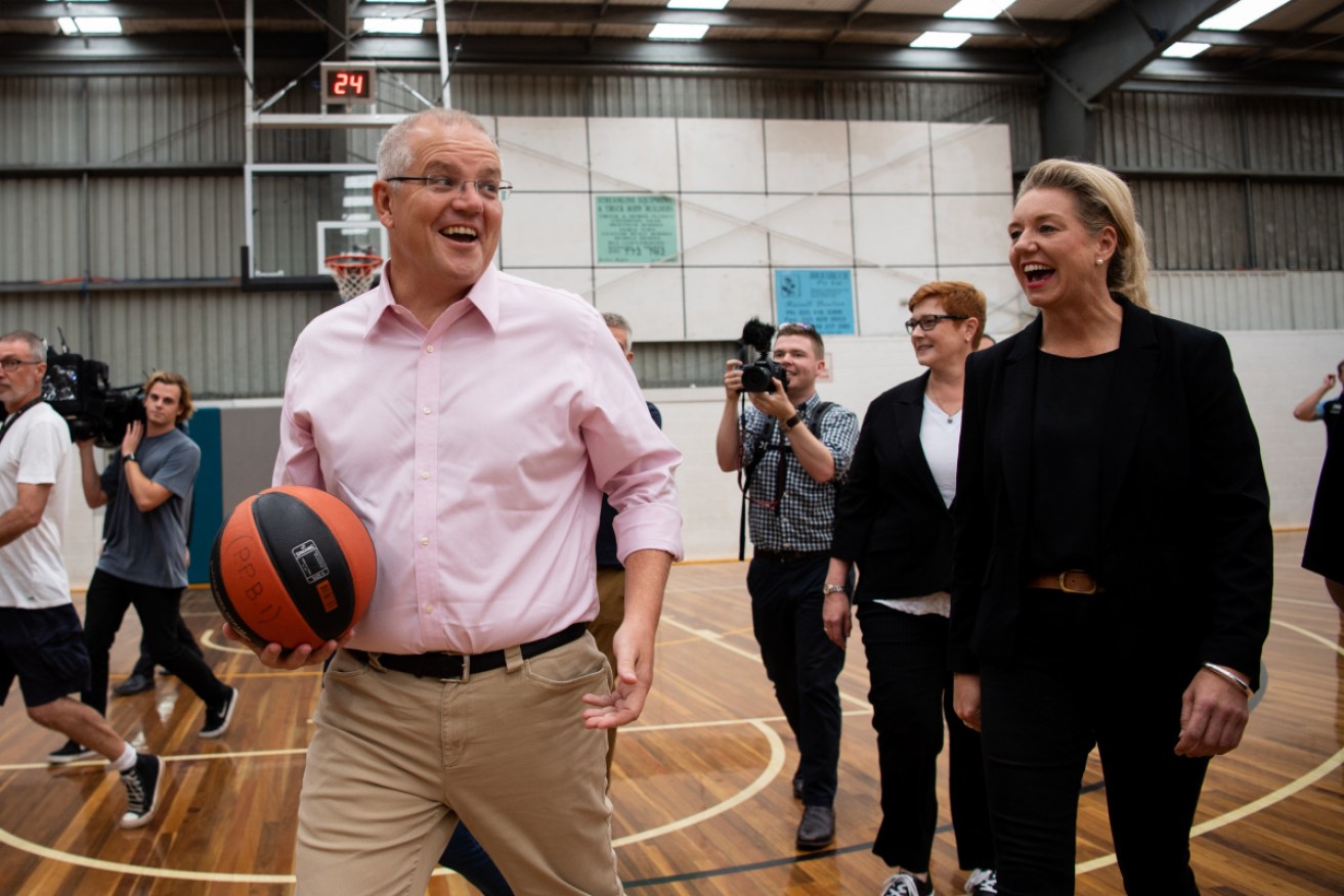 Prime Minister Scott Morrison, left, is standing by Senator Bridget McKenzie - for now.