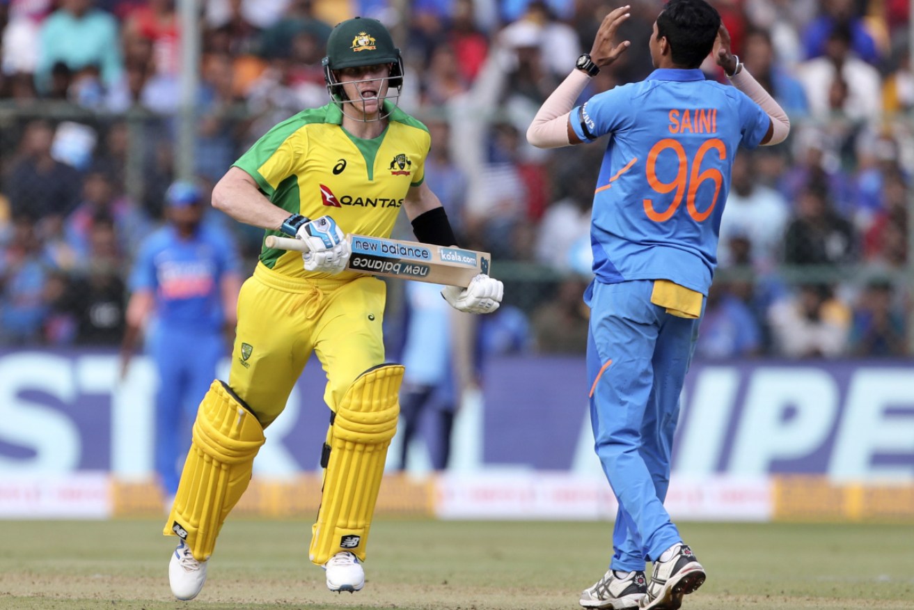 Steve Smith scored his first ODI century in three years but India waltzed home to a seven-wicket victory in the series decider against Australia.