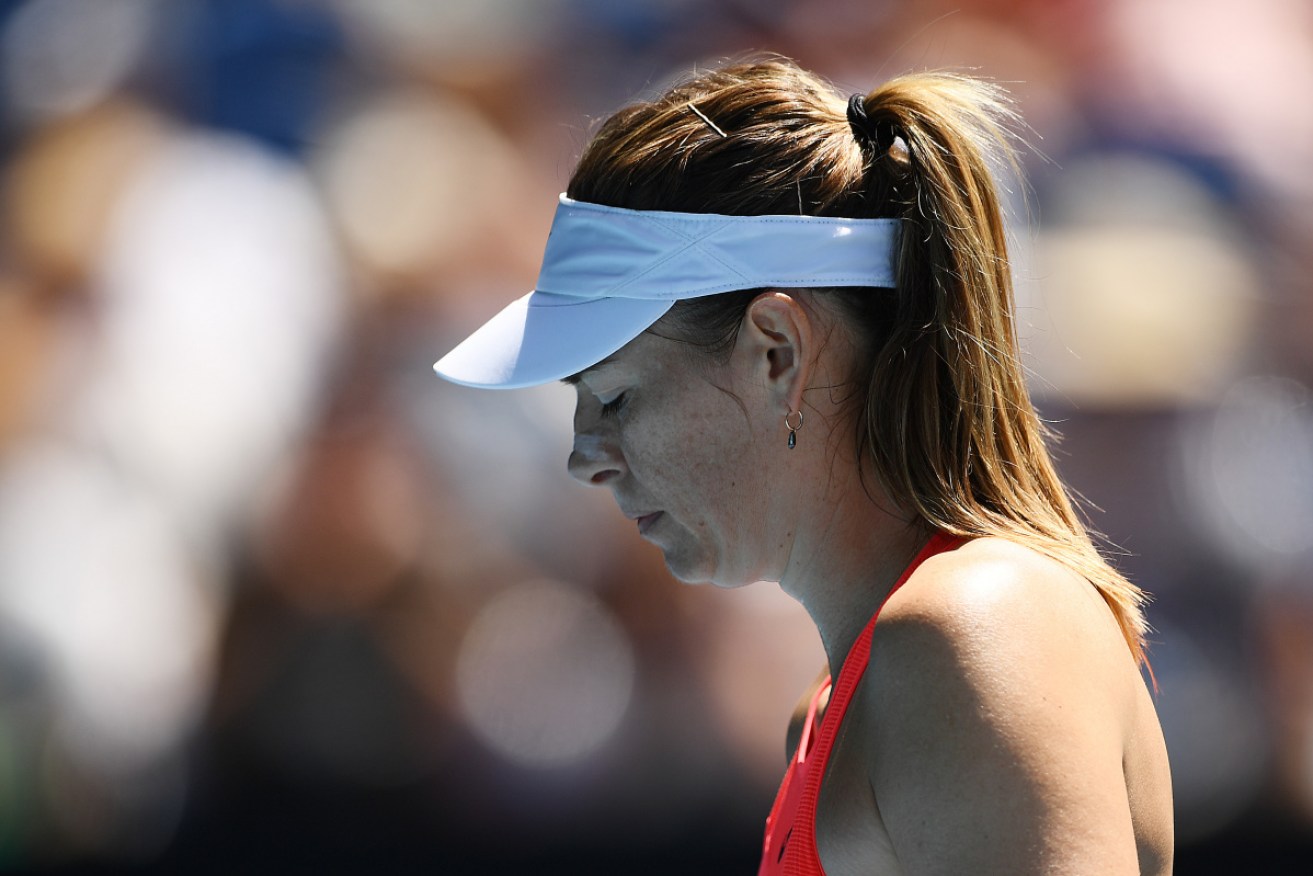 A despondent Maria Sharapova wilted on day two at the Australian Open.