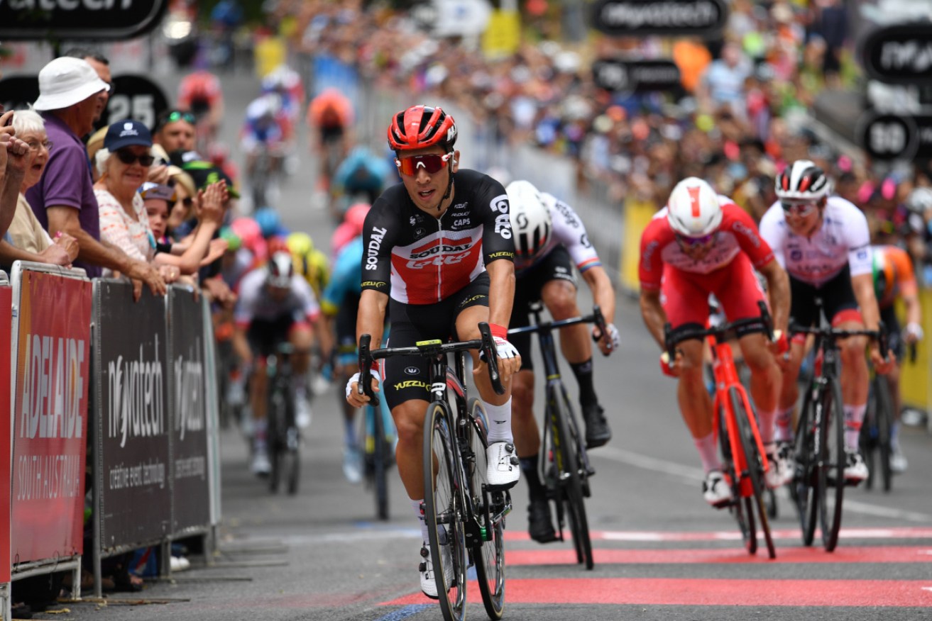 Caleb Ewan crosses the line to win stage two of the Tour Down Under from Woodside to Stirling.