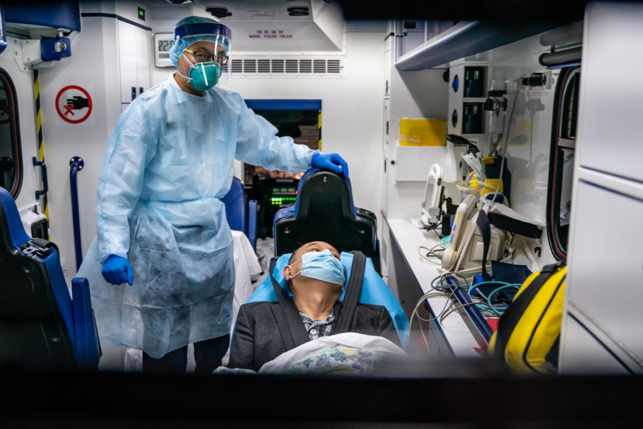 A patient is transferred by an ambulance to the Infectious Disease Centre of Princess Margaret Hospital.