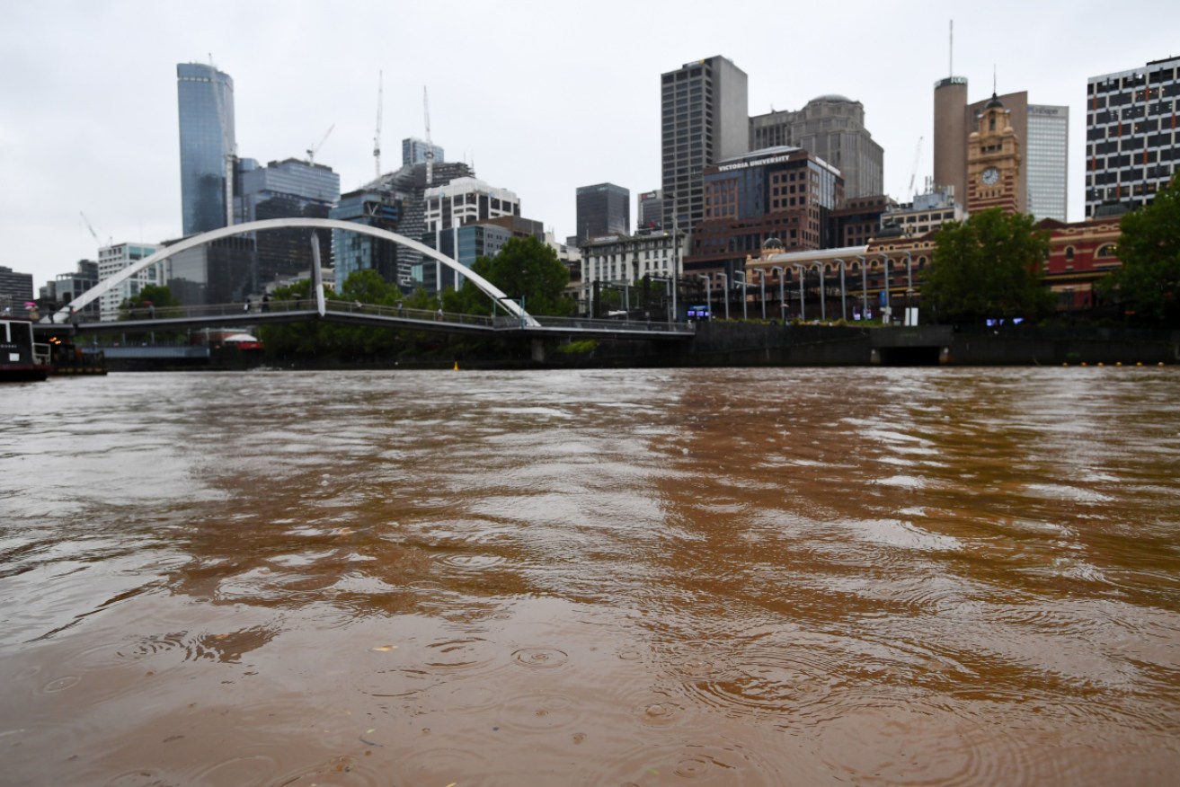 The Yarra River is seen filled with dust in Melbourne.