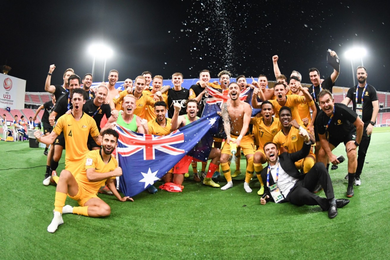 Olympics bound: The Olyroos in full celebration mode. 