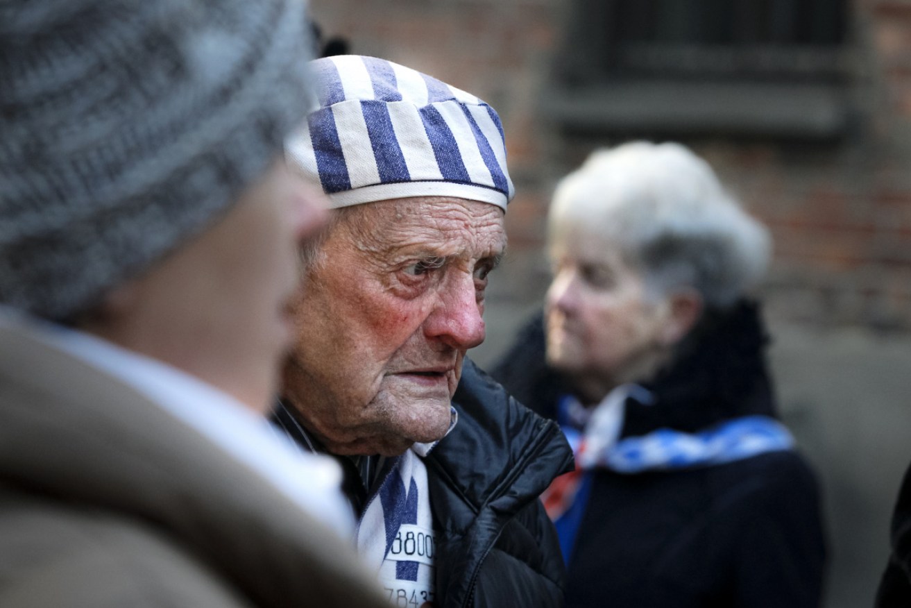 An Auschwitz survivor at the commemorations on Monday.