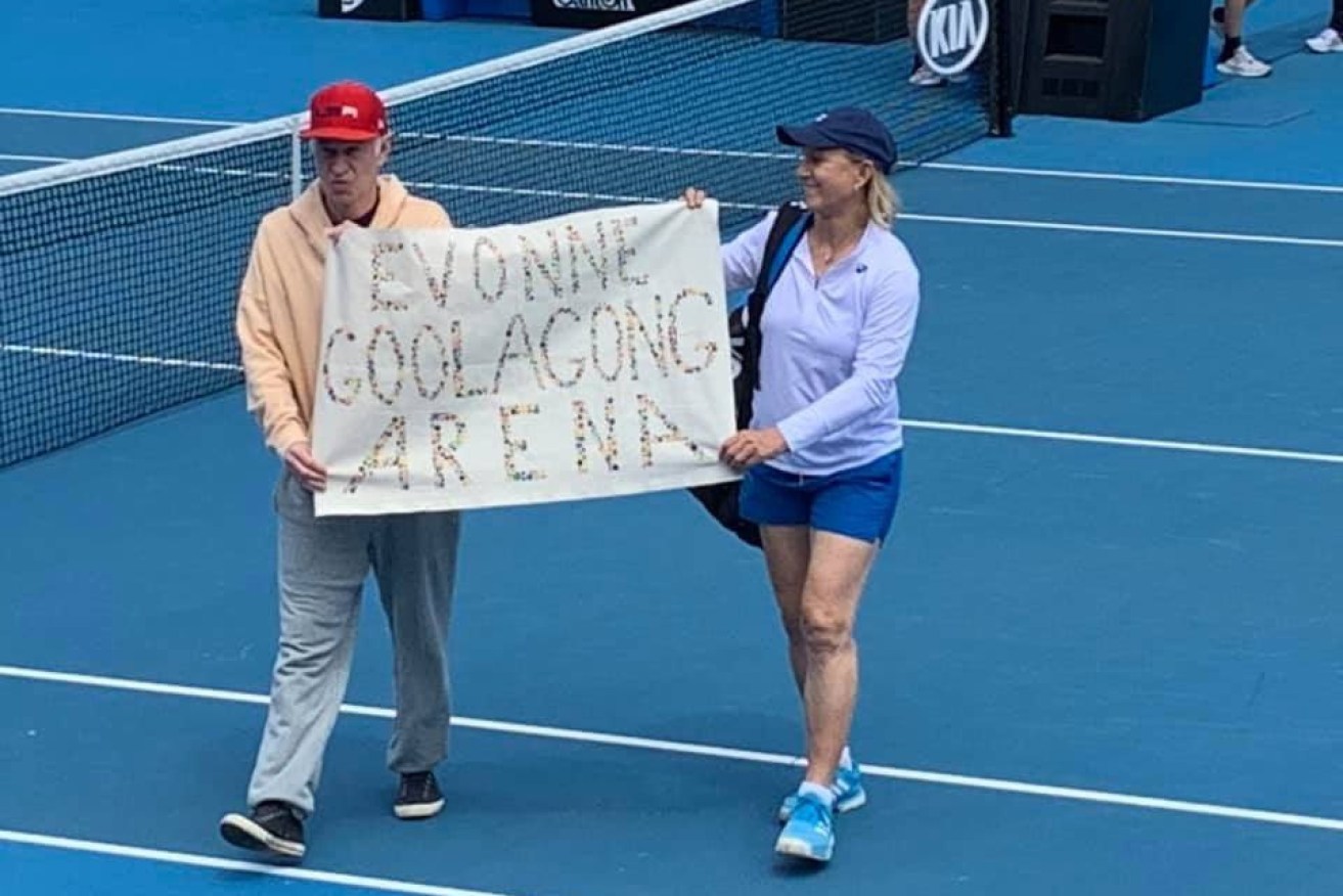 John McEnroe and Martina Navratilova make their point on Tuesday. Navratilova has since apologise for the "breach of protocol".