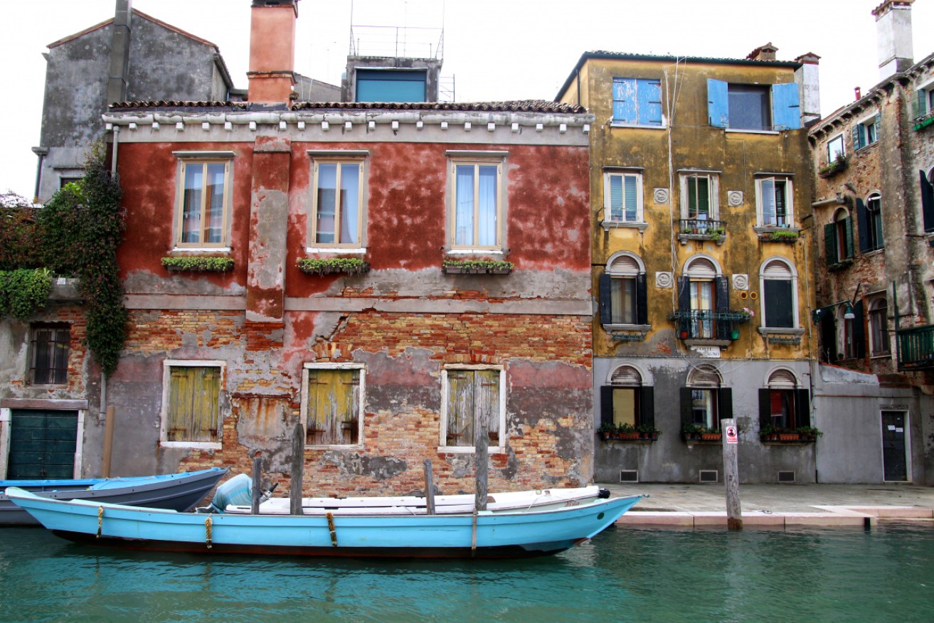 A quiet spot beside a canal in Venice – they can be found. <i>Photo: Susan Gough Henley</i>