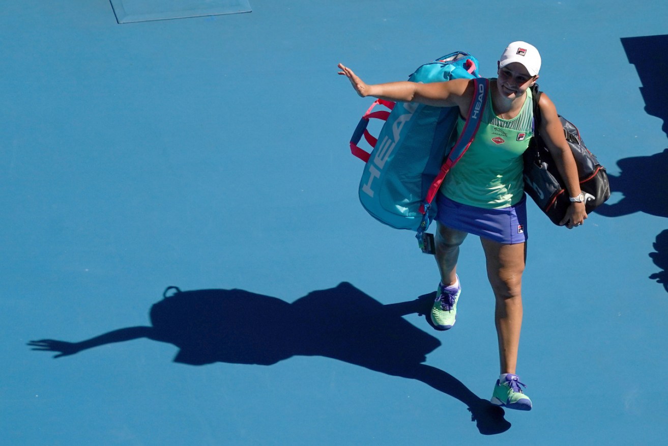 Farewell to all that: Ash Barty leaves the court after losing her semi-final on Thursday. 