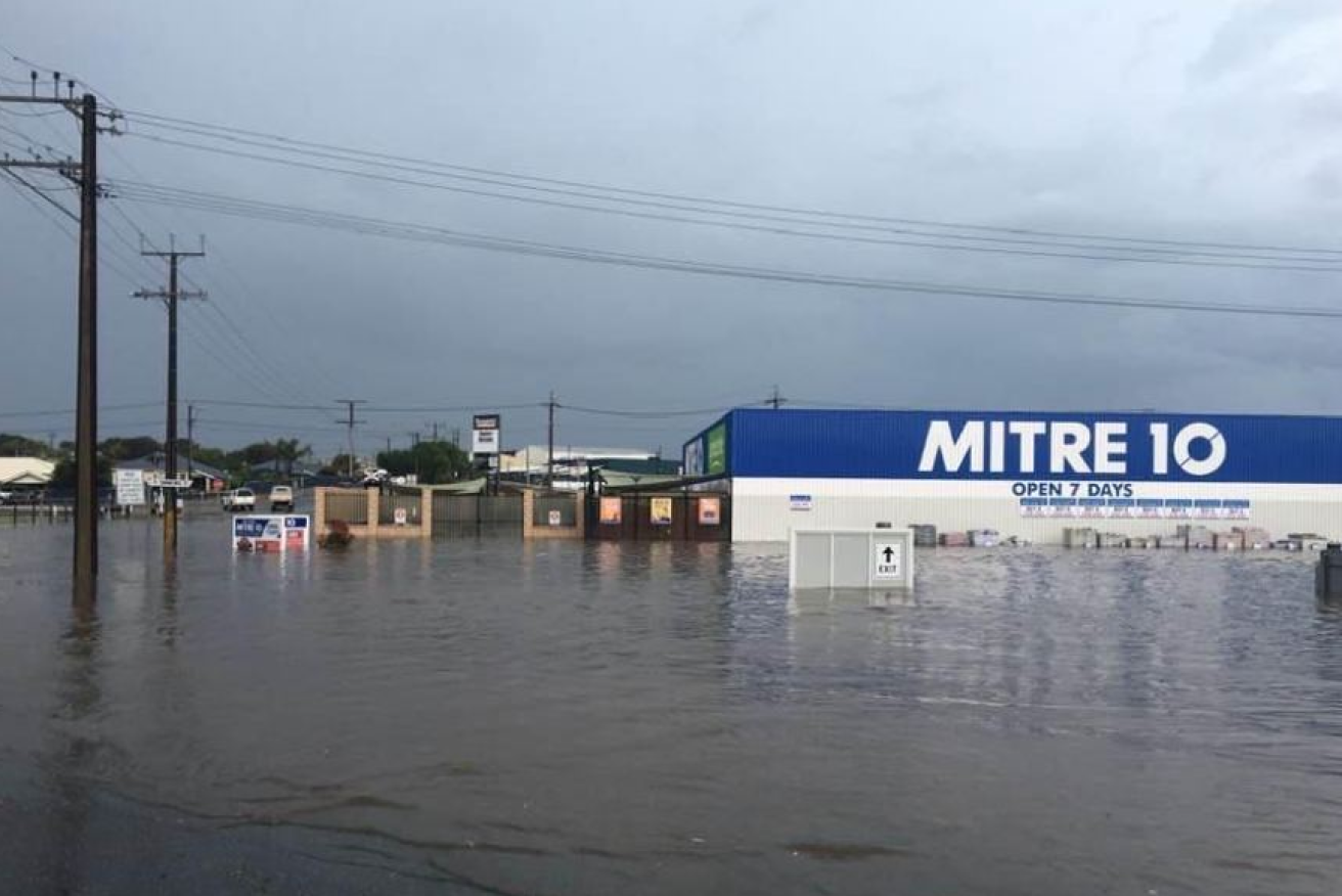 Flooding makes an island of this hardware story in suburban Adelaide.