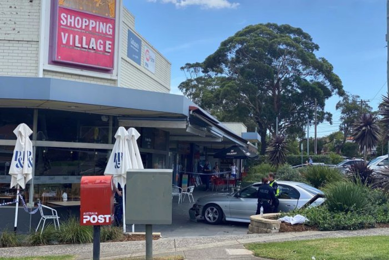 The scene outside the North Epping coffee shop where a woman died on Friday morning.