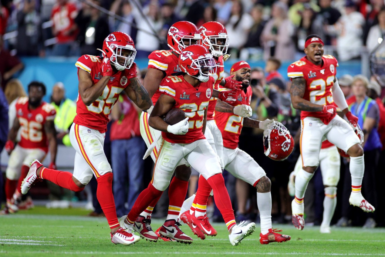 Kansas City Chiefs players celebrate after a interception on their way to victory over the San Francisco 49ers.