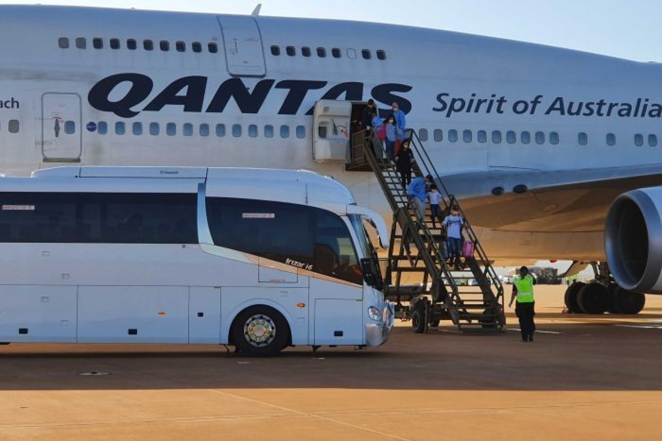 The first of the evacuated Australians landed at the RAAF base Learmonth on Monday afternoon. Photo: Department of Home Affairs