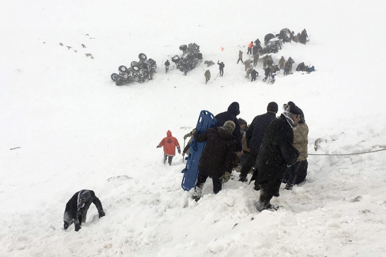 Work continues to rescue 25 people buried under an avalanche in 
Turkey's Bahcesaray district. 