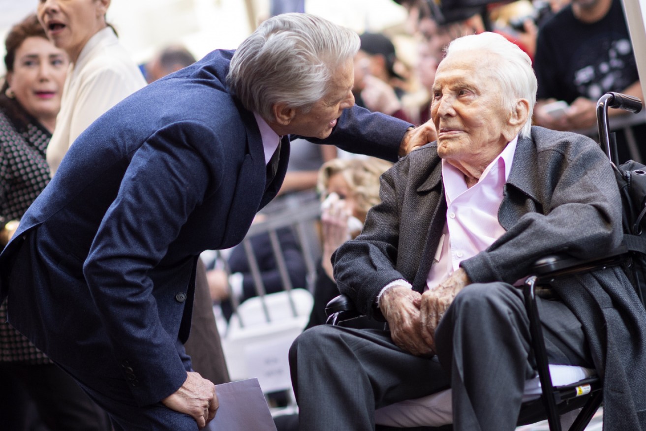 Kirk Douglas, with son Michael, at a ceremony to award him with a Hollywood star in 2018.