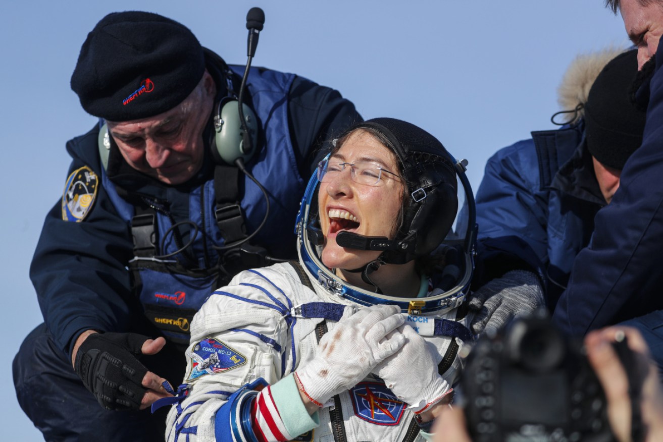 Christina Koch shortly after the landing of the Russian space capsule about 150km south-east of the Kazakh town of Zhezkazgan.