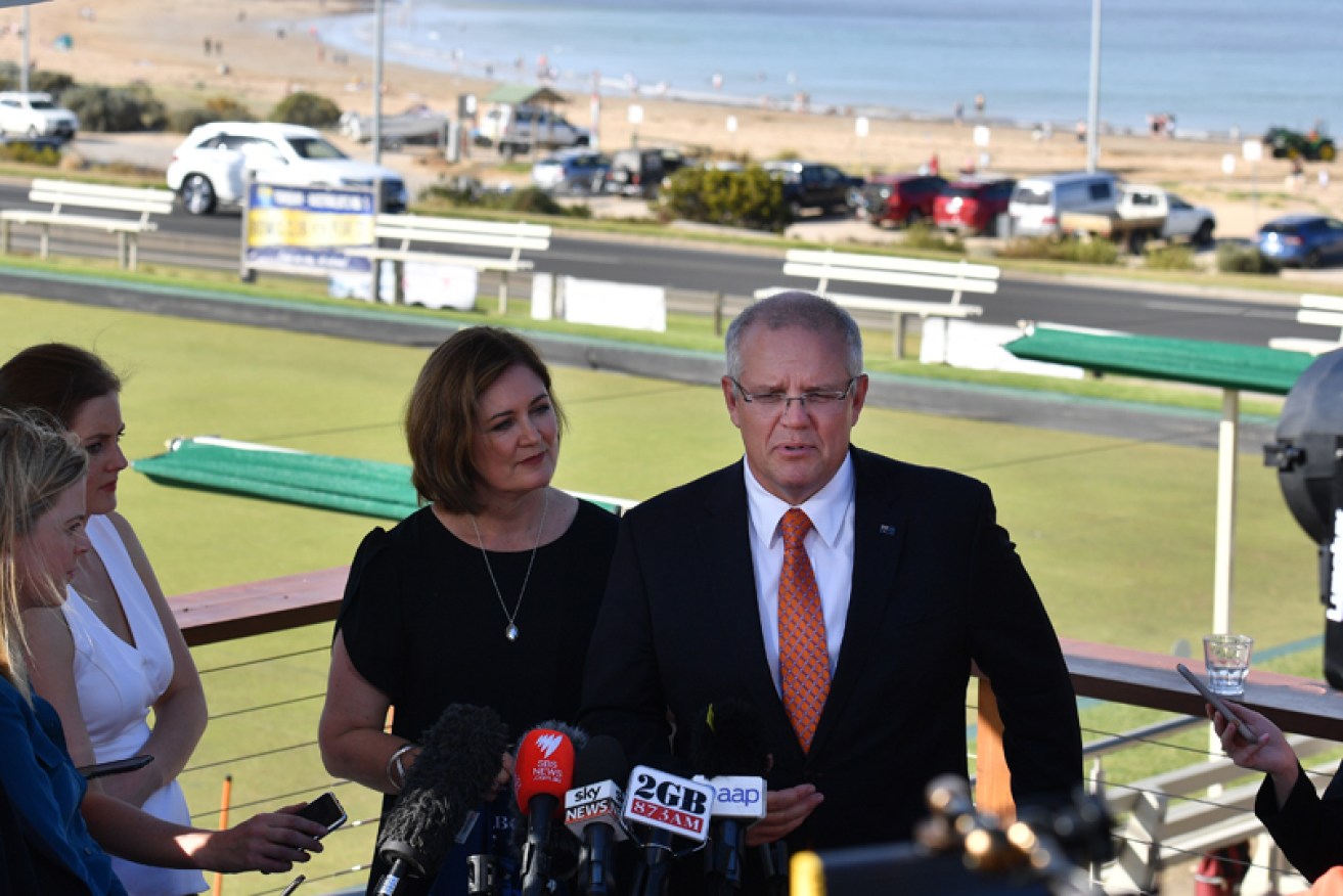Sarah Henderson and Scott Morrison campaign in Torquay in May 2019.