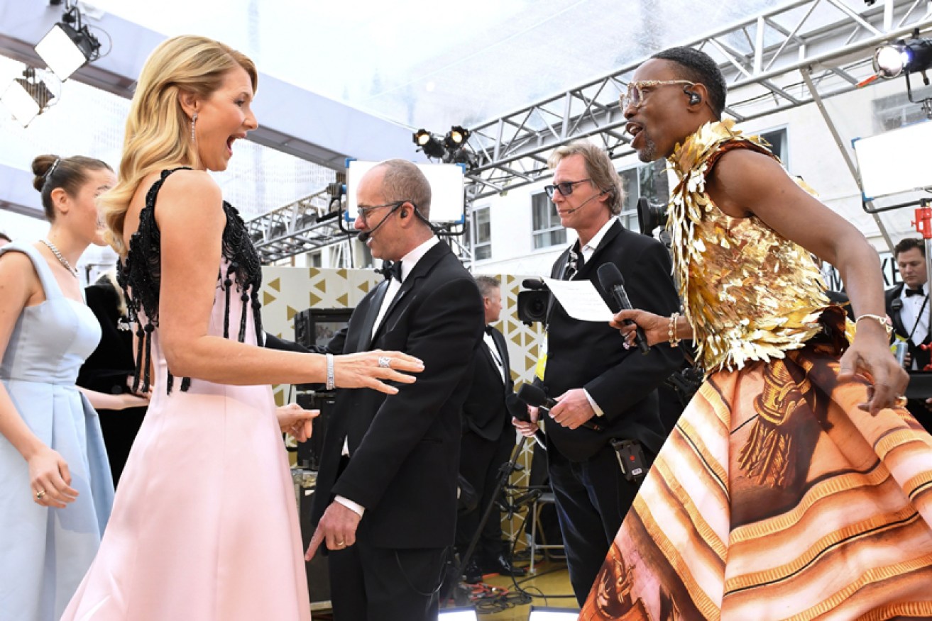 Laura Dern greets Billy Porter on the red carpet at the 92nd Academy Awards in Los Angeles on Monday (AEST).