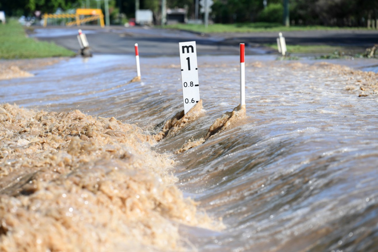 Flood water inundate a road in Dalby, Queensland.