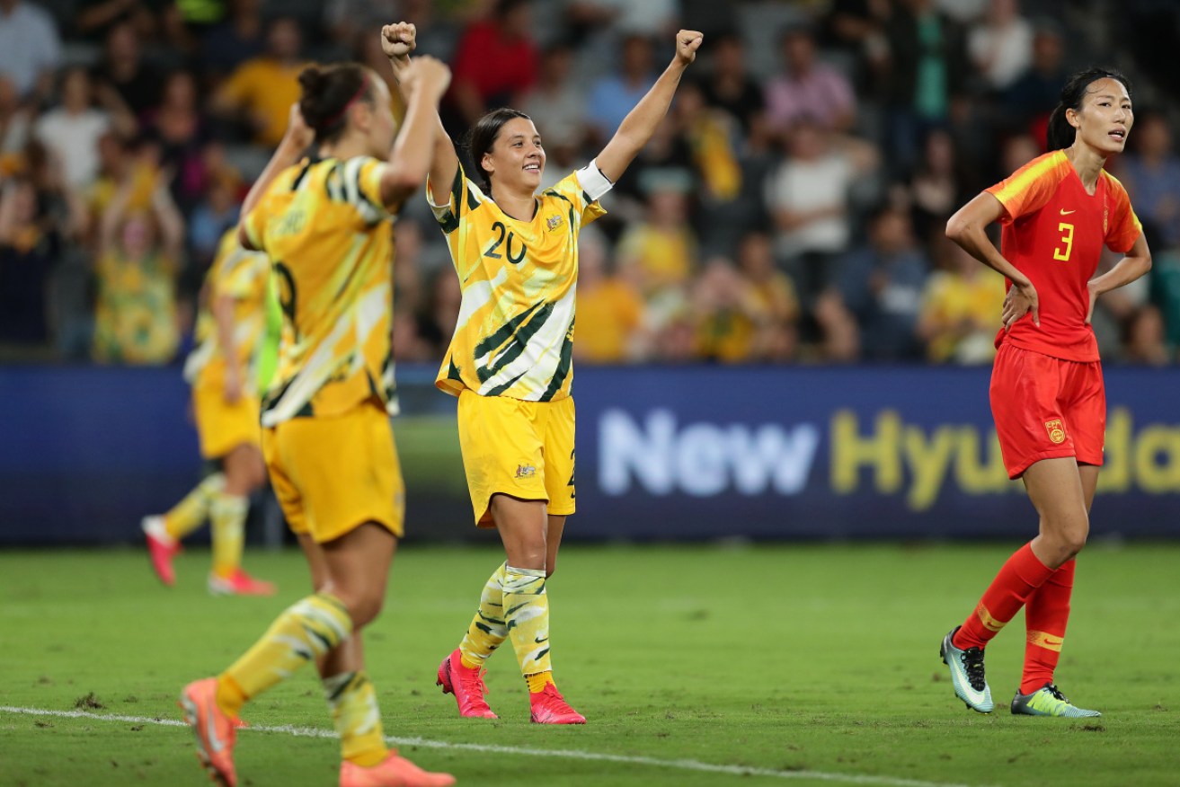 Matildas captain Sam Kerr celebrates at the final whistle of Thursday night's 1-1 draw with China. 