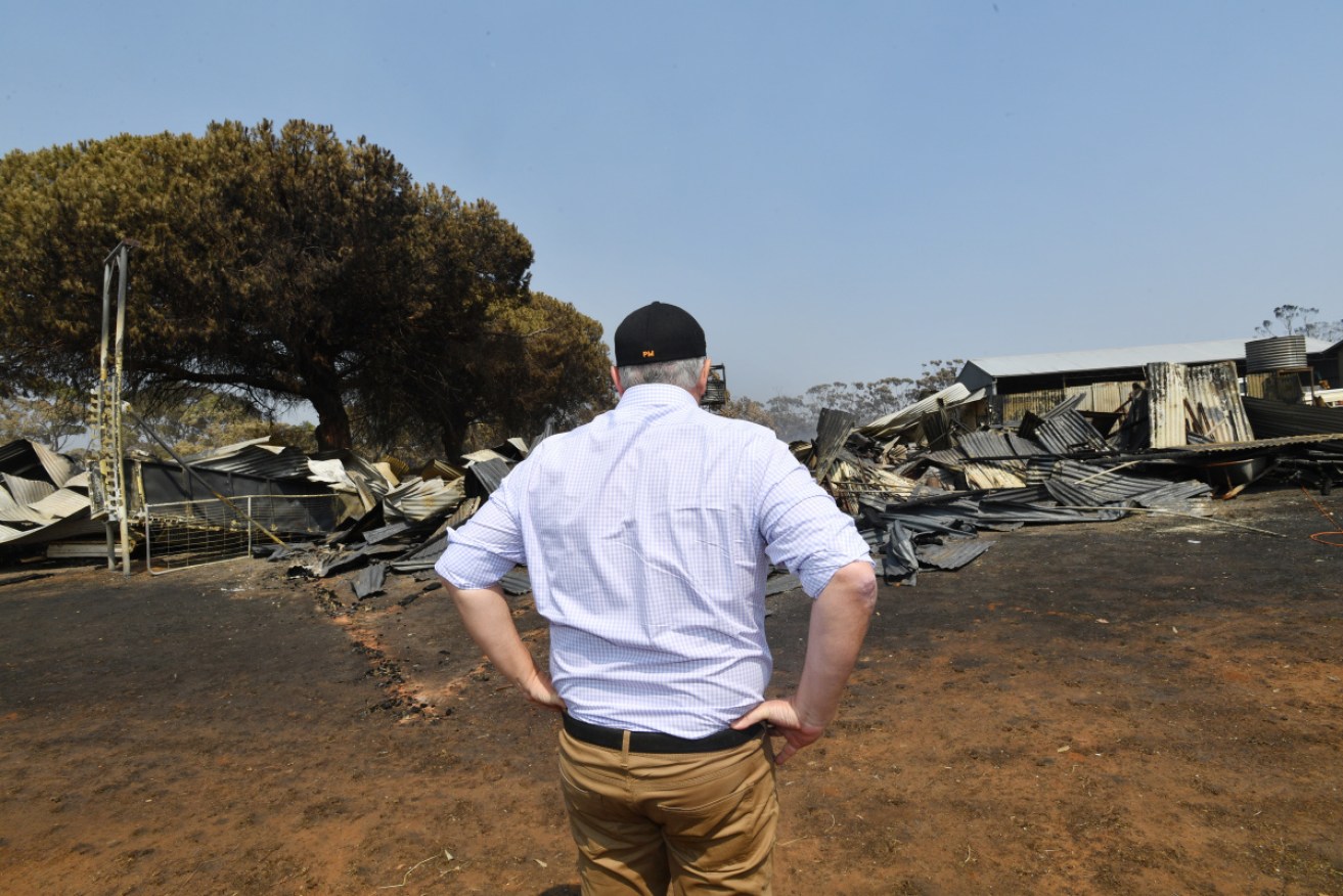 Mr Morrison surveys fire damage after damaging fires on Kangaroo Island in January.