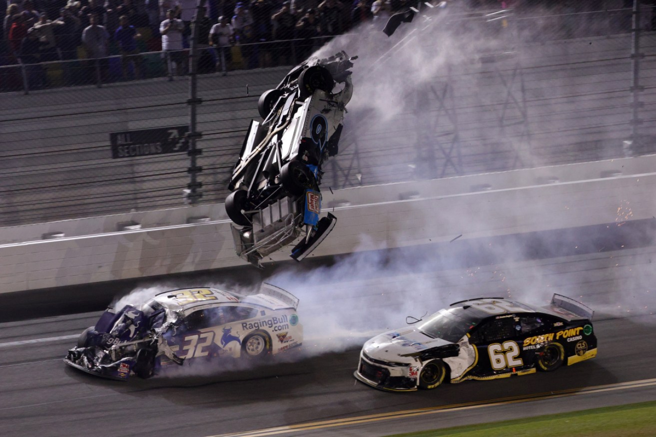 Ryan Newman flips over as he crashes during the NASCAR Cup Series.